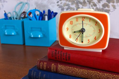 Retro TV style orange alarm clock