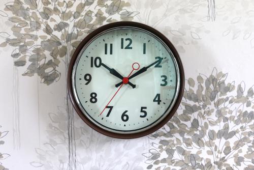 1950s brown metal wall clock