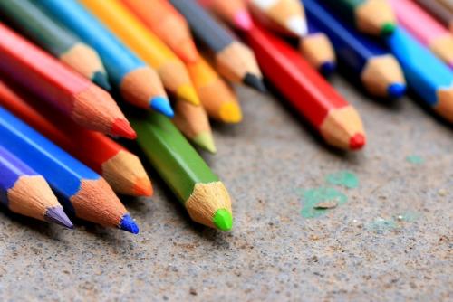 close up of colouring pencils close up of rainbow colouring pencils