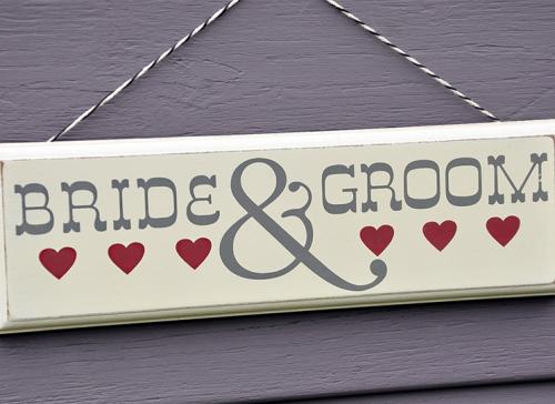 Bride and groom wooden sign