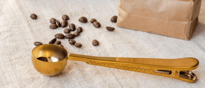 Coffee scoop with beans