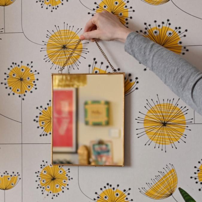 Brass hanging mirror