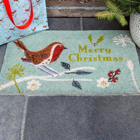 doormat with merry christmas on it