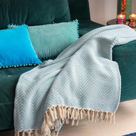 Blue throw on sofa