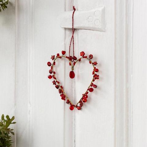 Red heart decoration on door