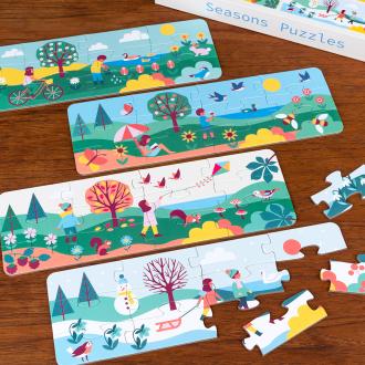 Four puzzles with spring, summer, autumn and winter scenes