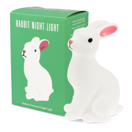 Rabbit-shaped battery-powered night light with pink ears, placed next to packaging box