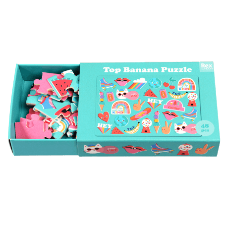 Top Banana puzzle pieces inside box