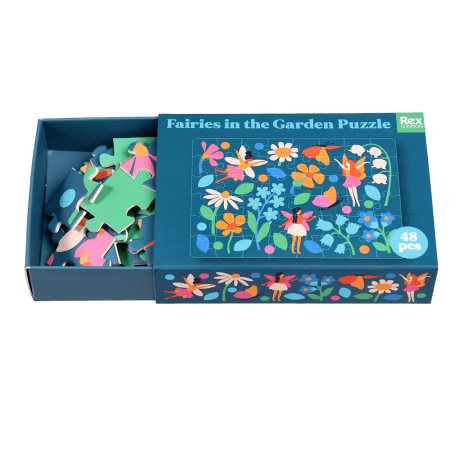 Fairies in the Garden puzzle pieces inside box