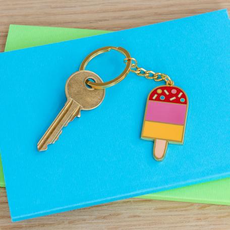 Ice lolly keyring on table with key attached