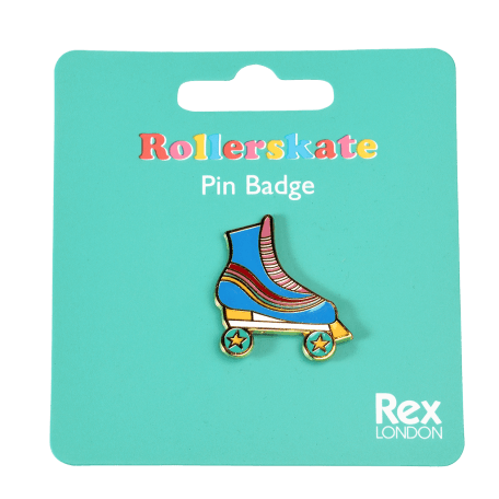 Roller skate pin badge attached to packaging