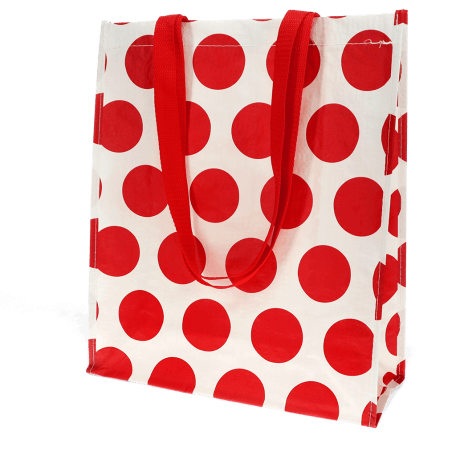 Recycled plastic shopping bag in cream with red spots