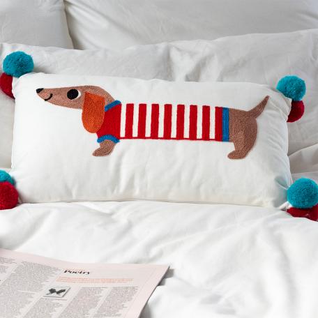 Embroidered cushion with pom poms - Sausage Dog