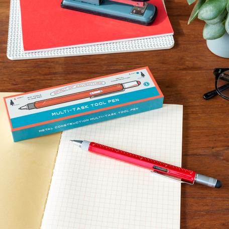 Red multi task tool pen with spirit level, touchscreen stylus and ruler in inches shown