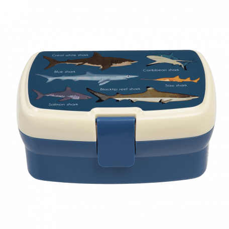 Dark blue lunch box with cream and dark blue lid featuring images of sharks