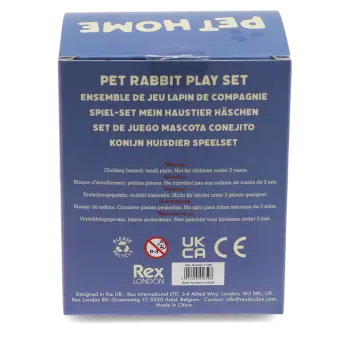 back of pet carrier box with multilingual safety warnings