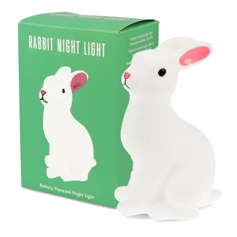 Rabbit-shaped battery-powered night light with pink ears, placed next to packaging box